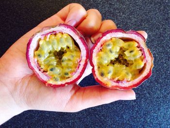 Cropped image of woman holding food