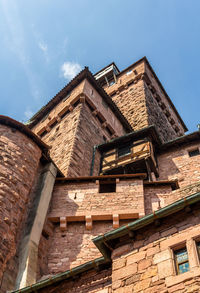 Low angle view of old building against sky