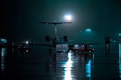 Airplane on runway at night