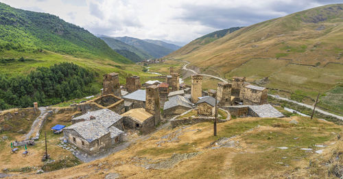 High angle view of castle on mountain against sky