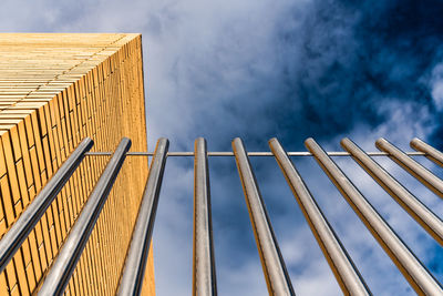 Low angle view of construction site against sky