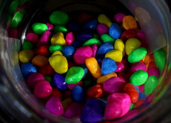 Close-up of multi colored candies in bowl