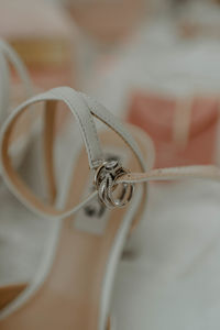 Close-up of wedding rings on metal