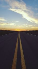 Empty road at sunset