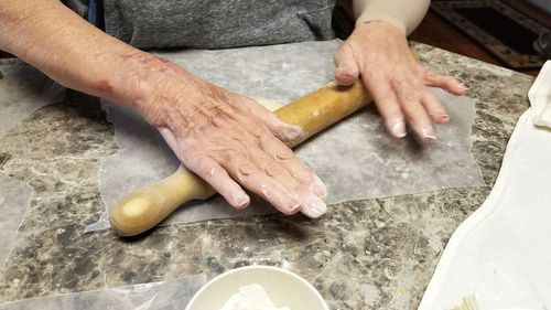 High angle view of man preparing food