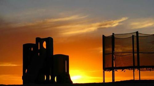 Sun shining through clouds