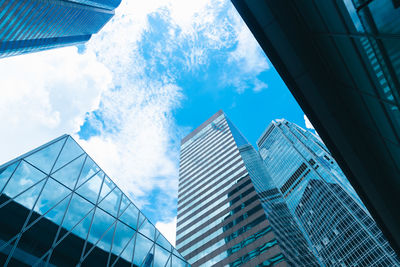 Low angle view of modern buildings against sky