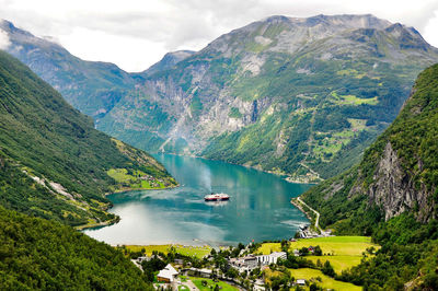 Scenic view of lake amidst mountains