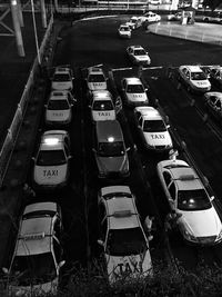 High angle view of taxis on road in traffic at night