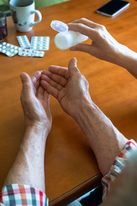 High angle view of people on table