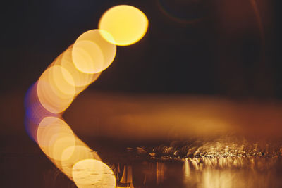 Close-up of illuminated light bulb