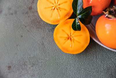 High angle view of orange fruit on table