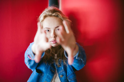 Portrait of woman standing in basement