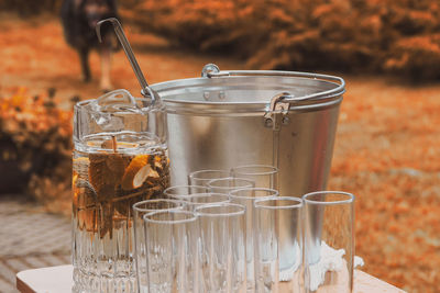 Close-up of drink in glass jar on table