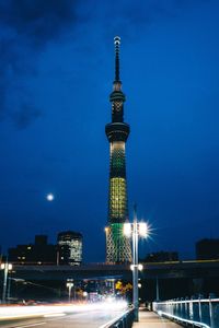 Clock tower in city at night