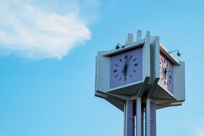 Low angle view of clock tower against sky