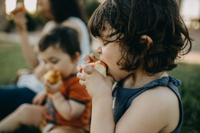 Portrait of child eating an apple