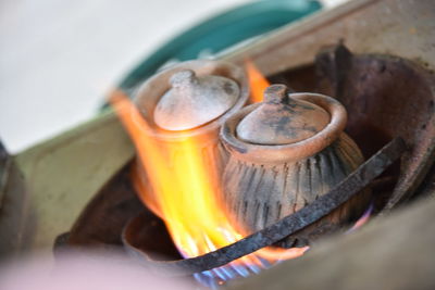 Close-up of fire on barbecue grill