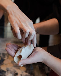 Close-up of hand holding food