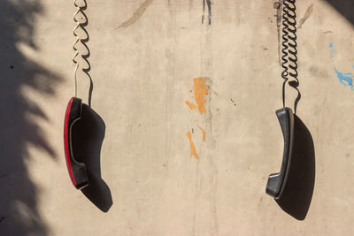 Close-up of clothes hanging on wall