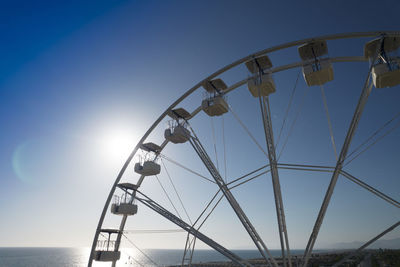 Aerial shot with a drone of a detail of a ferris wheel