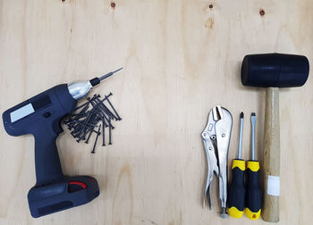 High angle view of hand tools on table