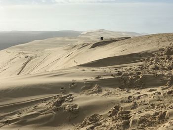 Aerial sand dune against sky