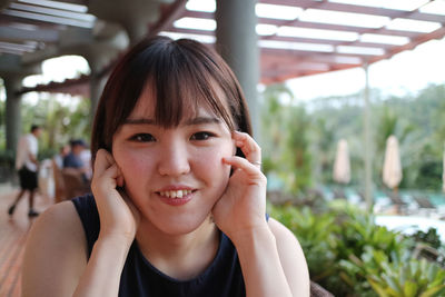 Close-up portrait of smiling woman