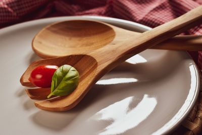 High angle view of vegetables in plate on table