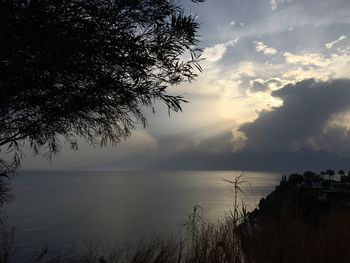 Scenic view of sea against sky at sunset