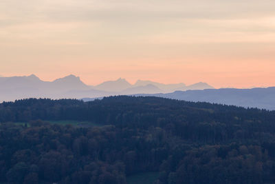 Scenic view of mountains against sky during sunset