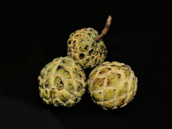 Close-up of bananas against black background