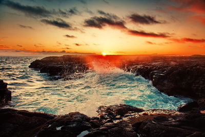 Scenic view of sea against sky during sunset