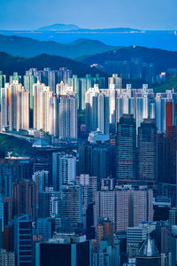 Modern buildings in city against sky