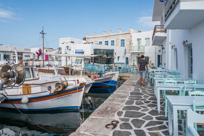 Boats moored at harbor