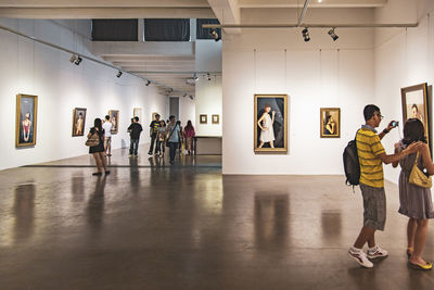 People standing in museum