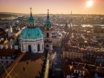 High angle view of city at sunset