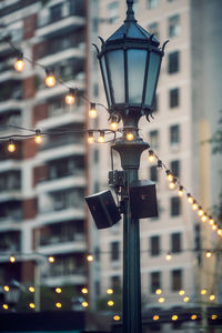 Close-up of illuminated street light