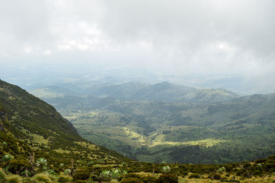 Aerial view of volcanic crater against a mountain background at aberdare ranges, kenya