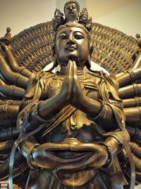 Low angle view of buddha statue