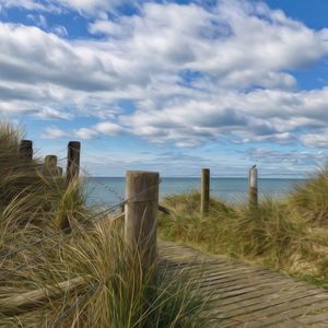Scenic view of beach against sky