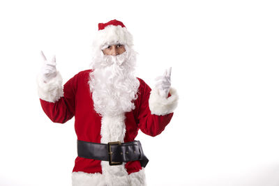 High angle view of christmas decorations over white background