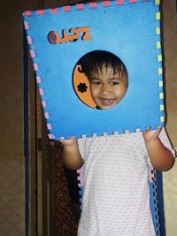 Portrait of cute boy smiling