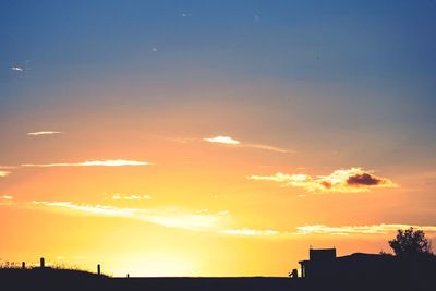 Scenic view of dramatic sky during sunset