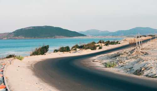 Scenic view of beach against clear sky