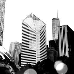 Modern buildings against clear sky