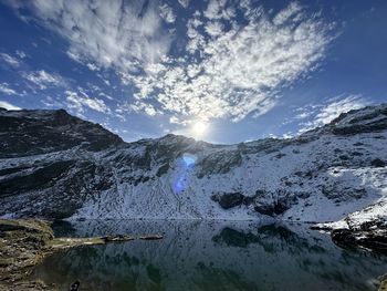 Scenic view of snowcapped mountains against sky