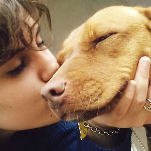 Close-up of woman with dog