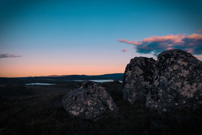 Scenic view of dramatic landscape during sunset