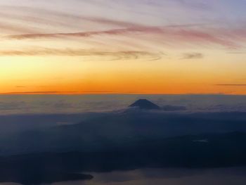 Scenic view of dramatic sky during sunset